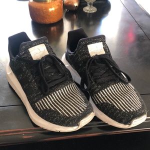 Women’s Adidas sneakers.